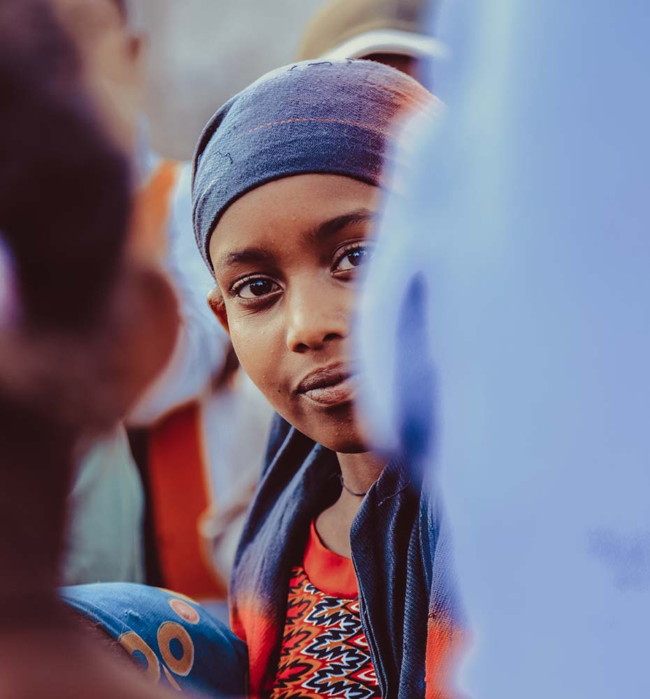 Young girl in a crowded market